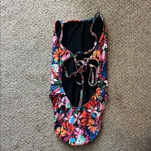 jolyn tie back onesie